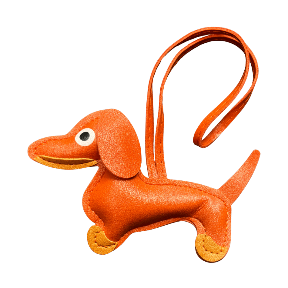 Väsksmycke i PU läder: Tax Nyckelring