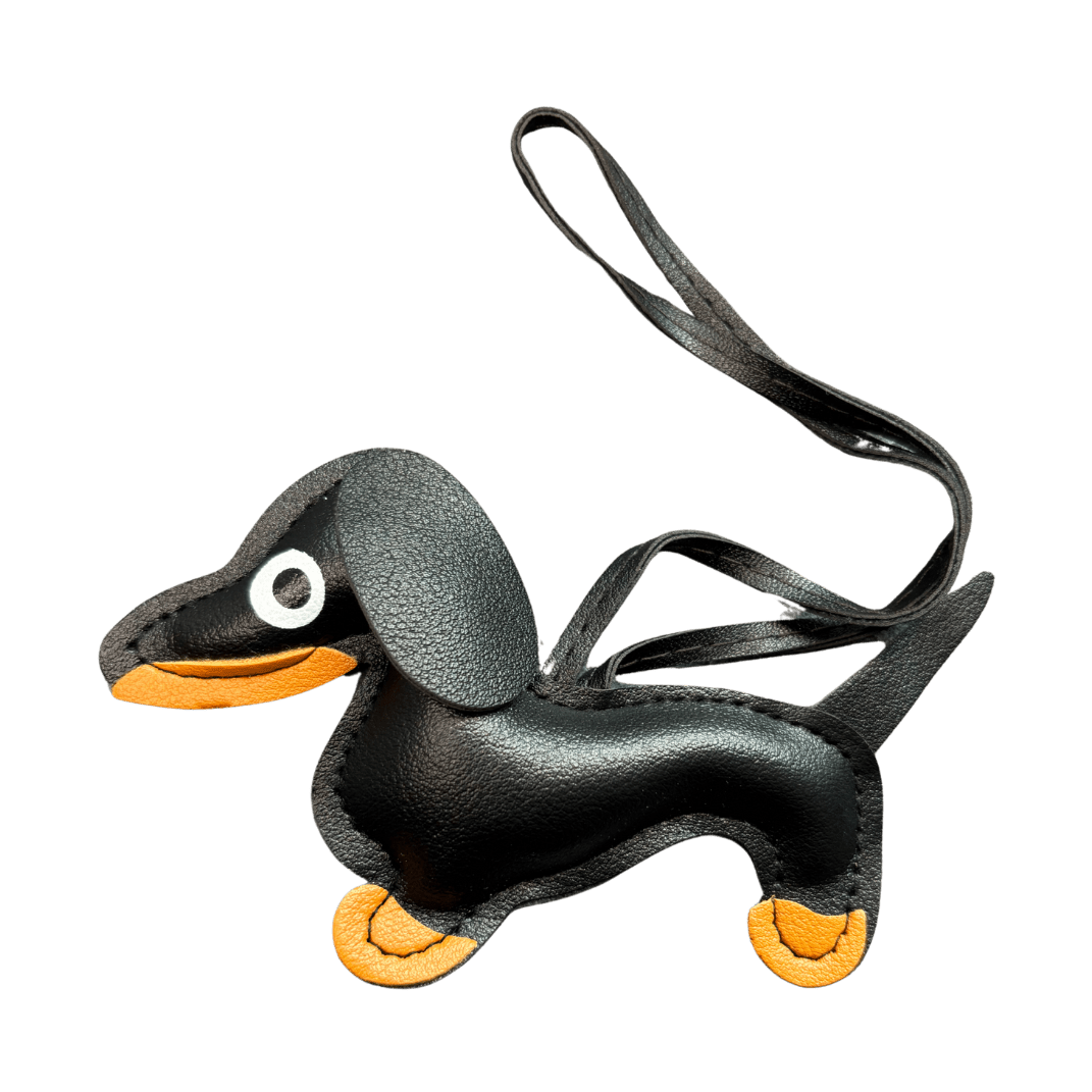 Väsksmycke i PU läder: Tax Nyckelring