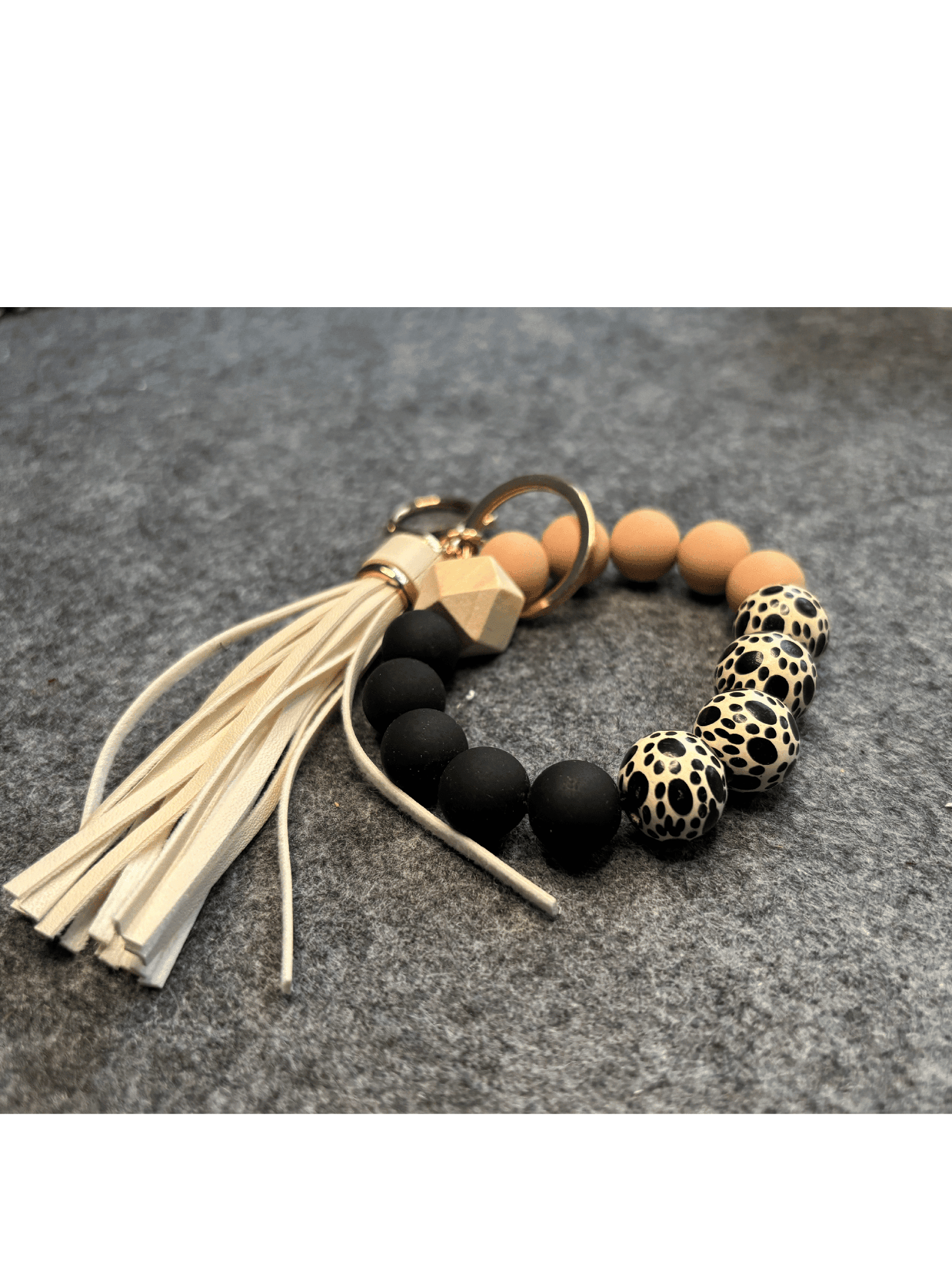 Nyckelring: Armband med hundtass pärlor Nyckelringar