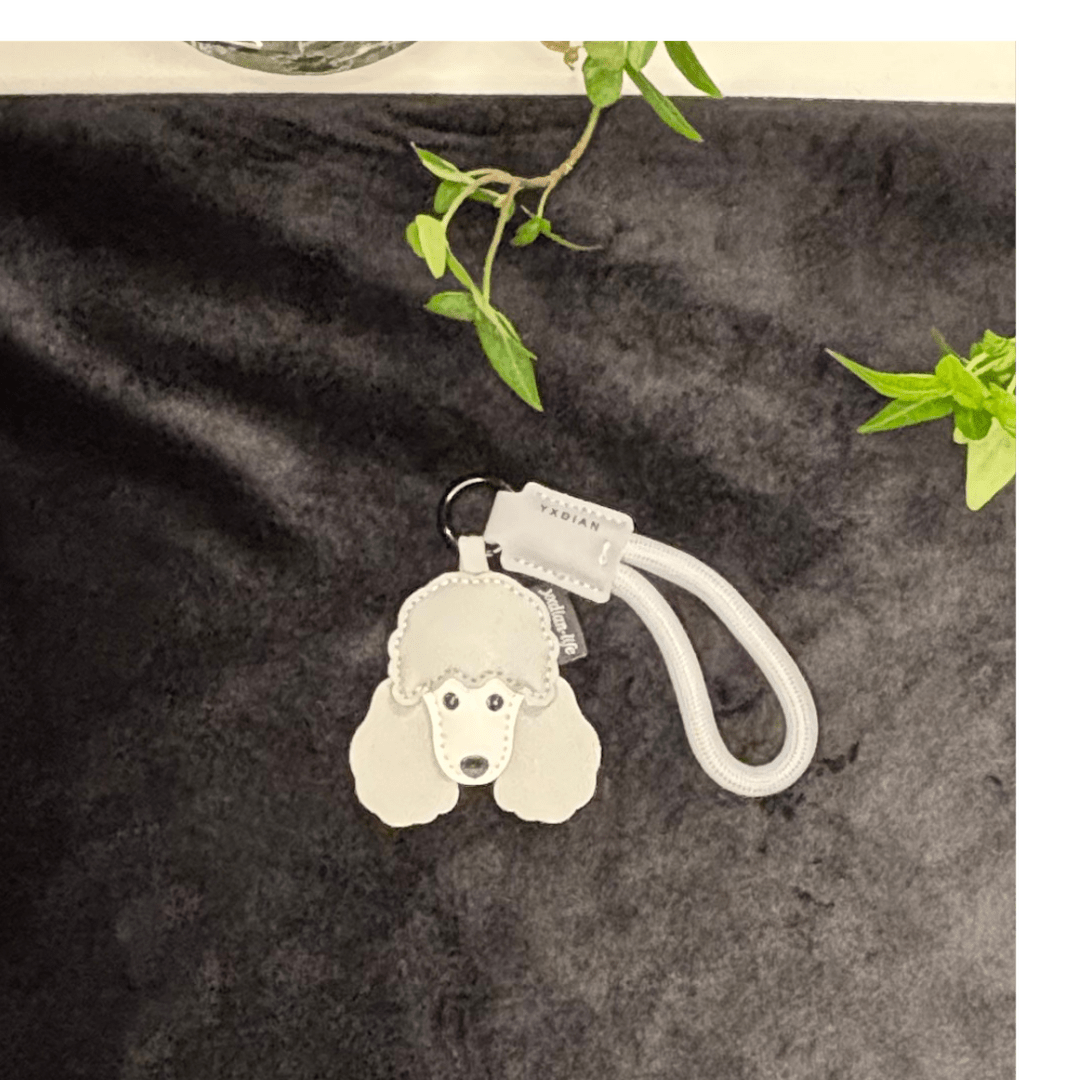 Väsksmycke Pudel PU läder 