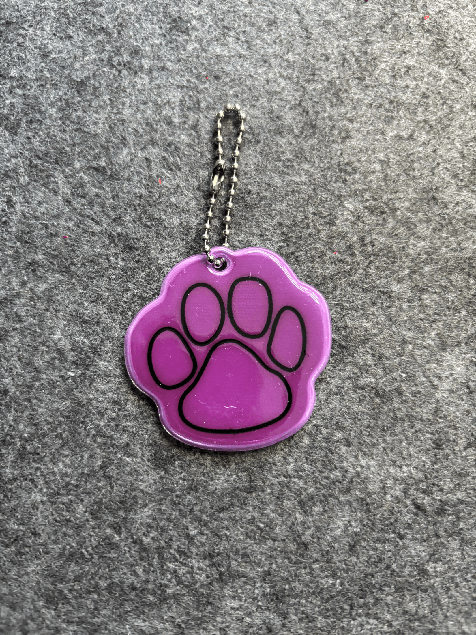 Reflex med tassavtryck Reflex