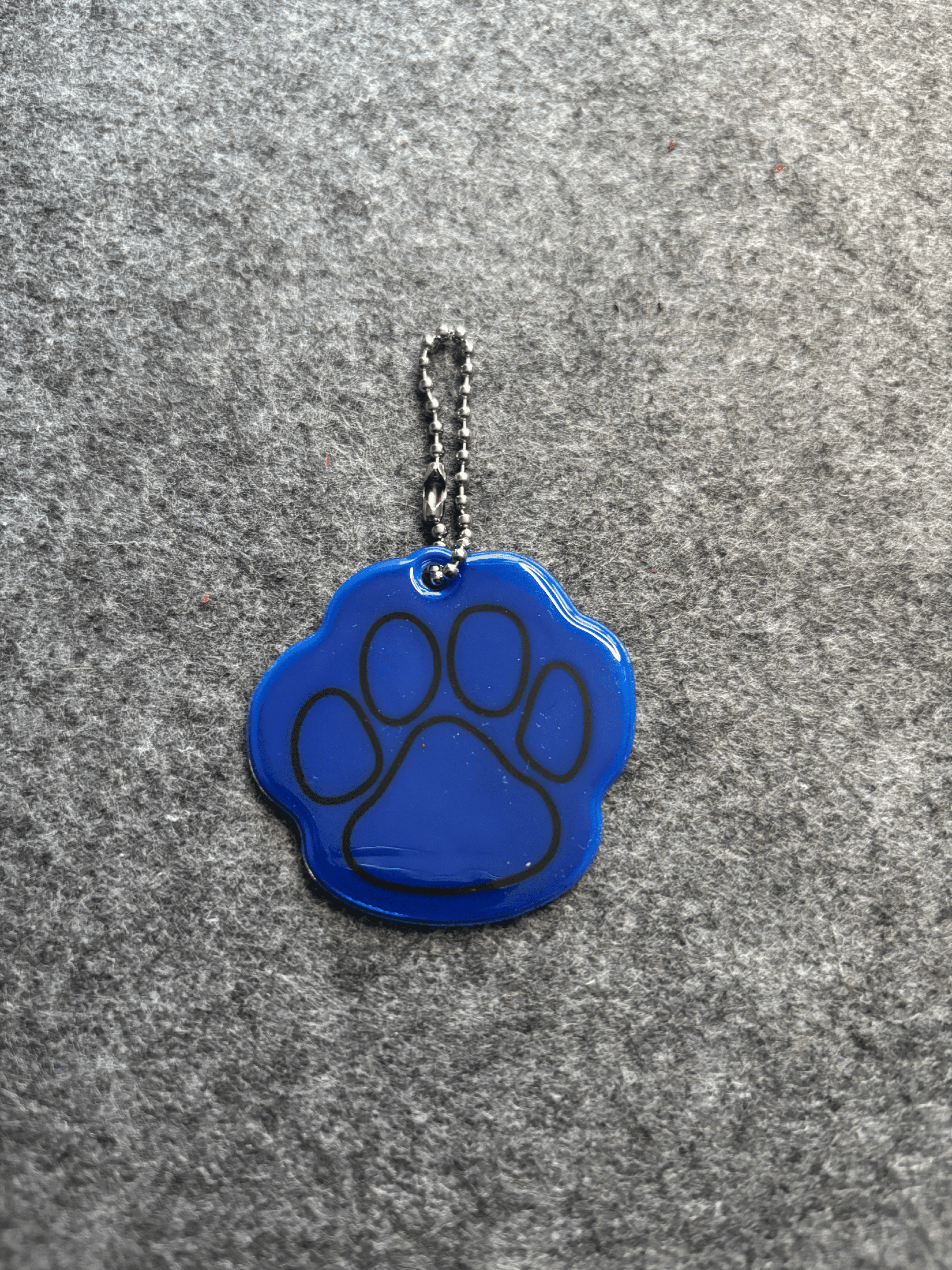 Reflex med tassavtryck Reflex