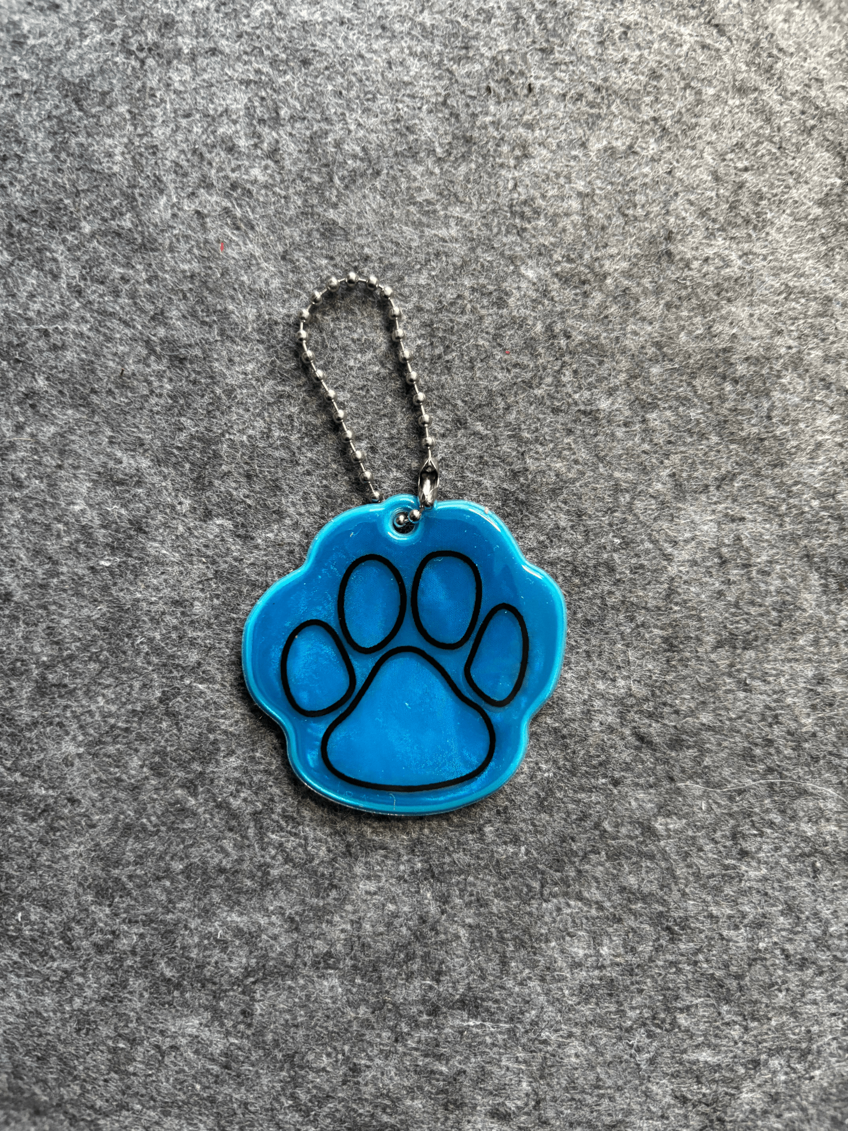 Reflex med tassavtryck Reflex