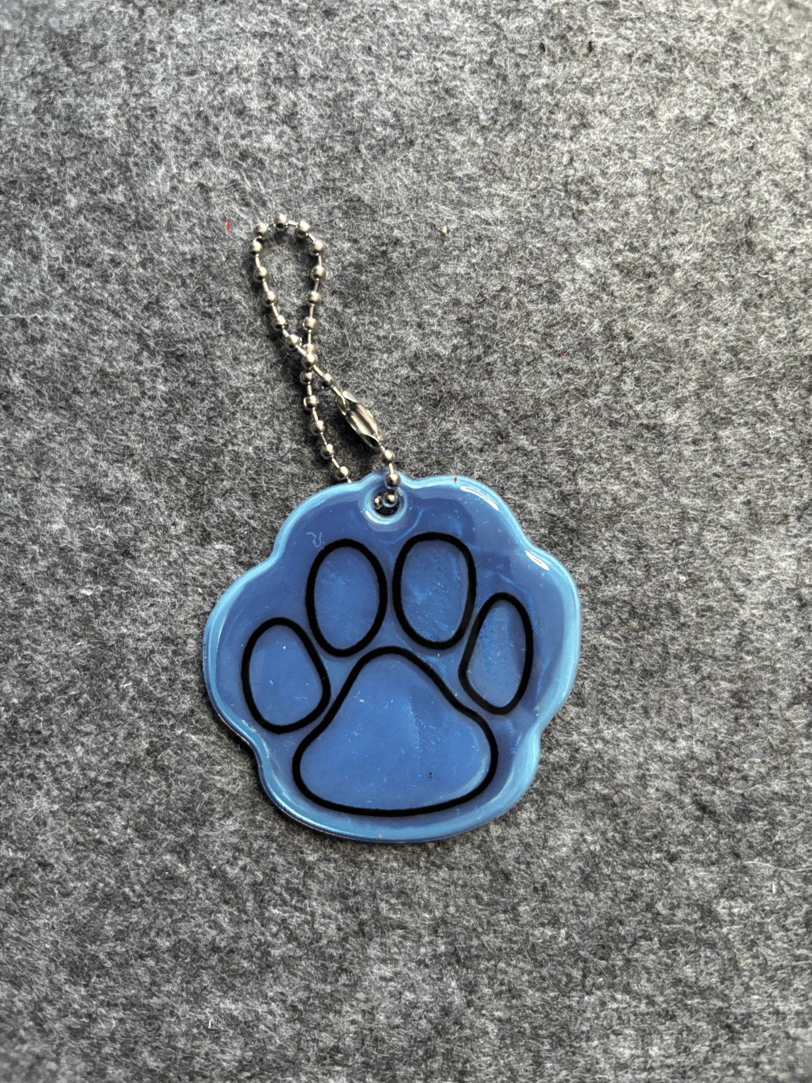 Reflex med tassavtryck Reflex