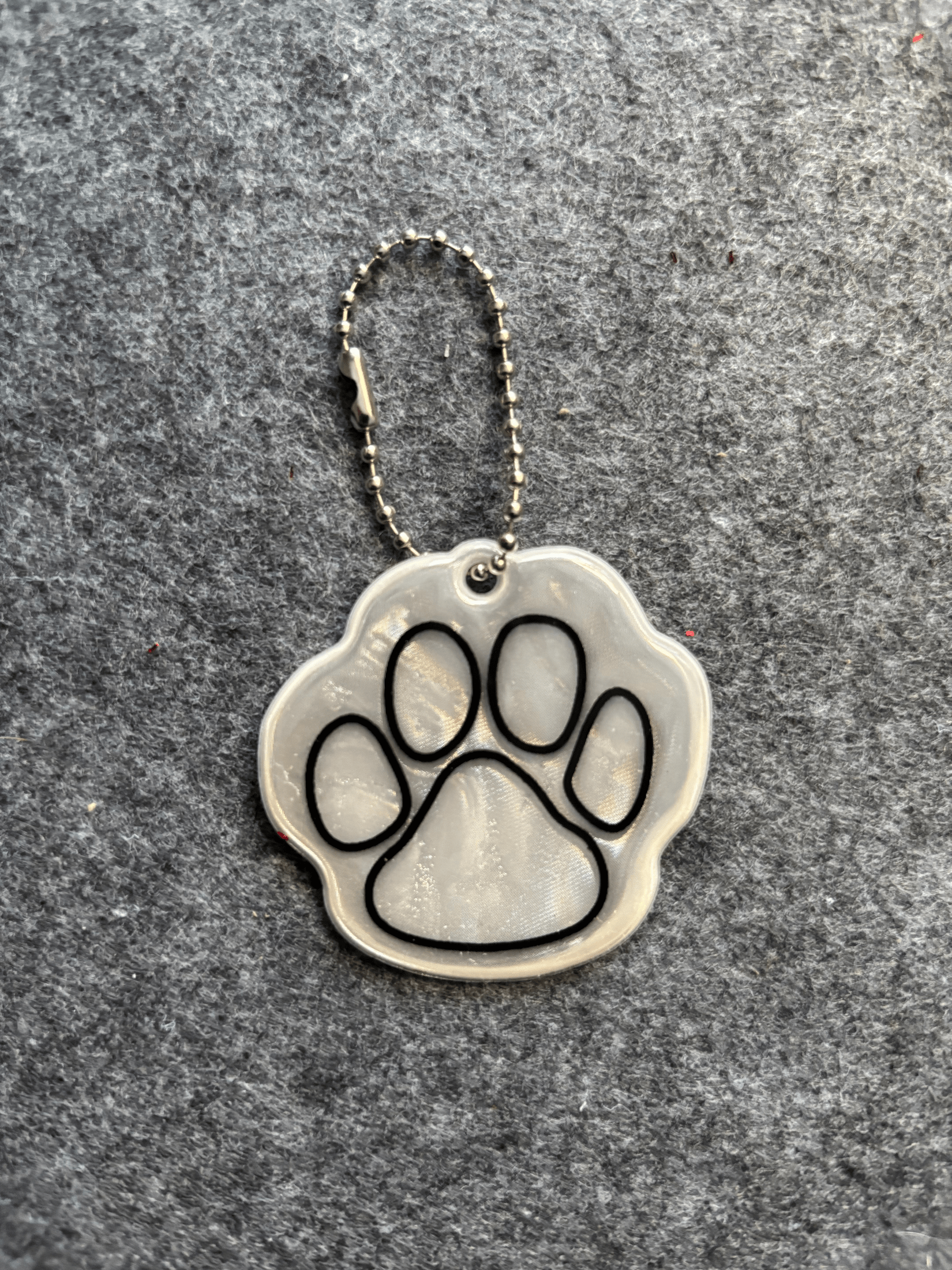 Reflex med tassavtryck Reflex